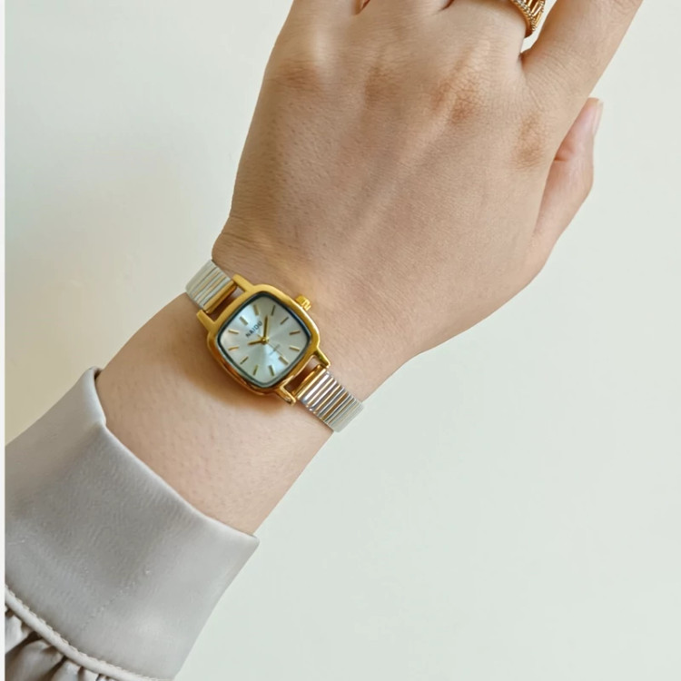 ساعت زنانه نایدو طلایی نقره ای