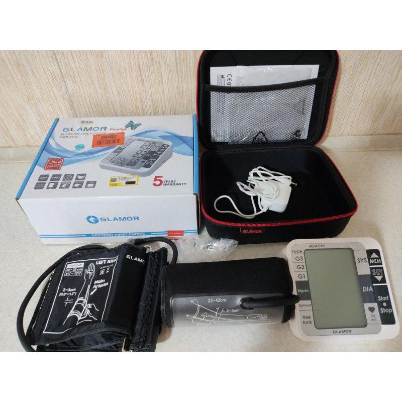 فشارسنج بازویی دیجیتال گلامور مدل TMB-1112 دو کاربره با حافظه 250 رکورد، تشخیص آریتمی، فناوری WMI، منبع انرژی برق و باتری، کاف فنری و ساده برای بازوی 22 تا 42 سانتیمتر، نمایش میانگین نتایج و خاموشی خودکار