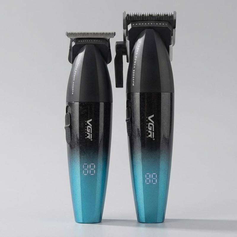 ماشین اصلاح موی سر و صورت شارژی وی جی ار مدل V-640 S2 با موتور 9000 دور در دقیقه، تیغه استیل پیشرفته خودتیزشونده، طراحی ارگونومیک، نمایشگر شارژ، قابلیت تنظیم سرعت، باتری 2000 میلی‌آمپر ساعت دو بسته 2 عددی