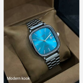 ساعت مچی مردانه کاسیو casio اصل ، صحفه مربعی آبی فیروزه ای ، بند استیل نقره ای کد 3205