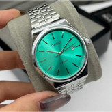 ساعت مچی مردانه کاسیوCASIO وینتیج بند نقره ای صفحه نمایش گرد رنگ بندی کد 9023