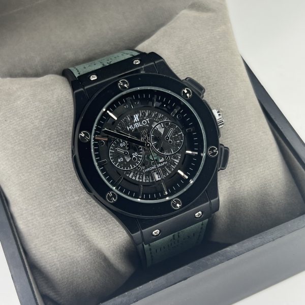 ساعت مردانه HUBLOT بند چرمی قاب فلزی