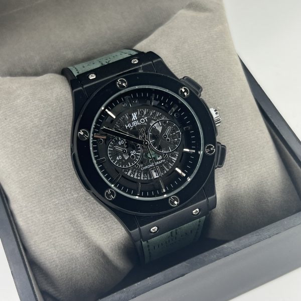 ساعت مردانه HUBLOT بند چرمی قاب فلزی