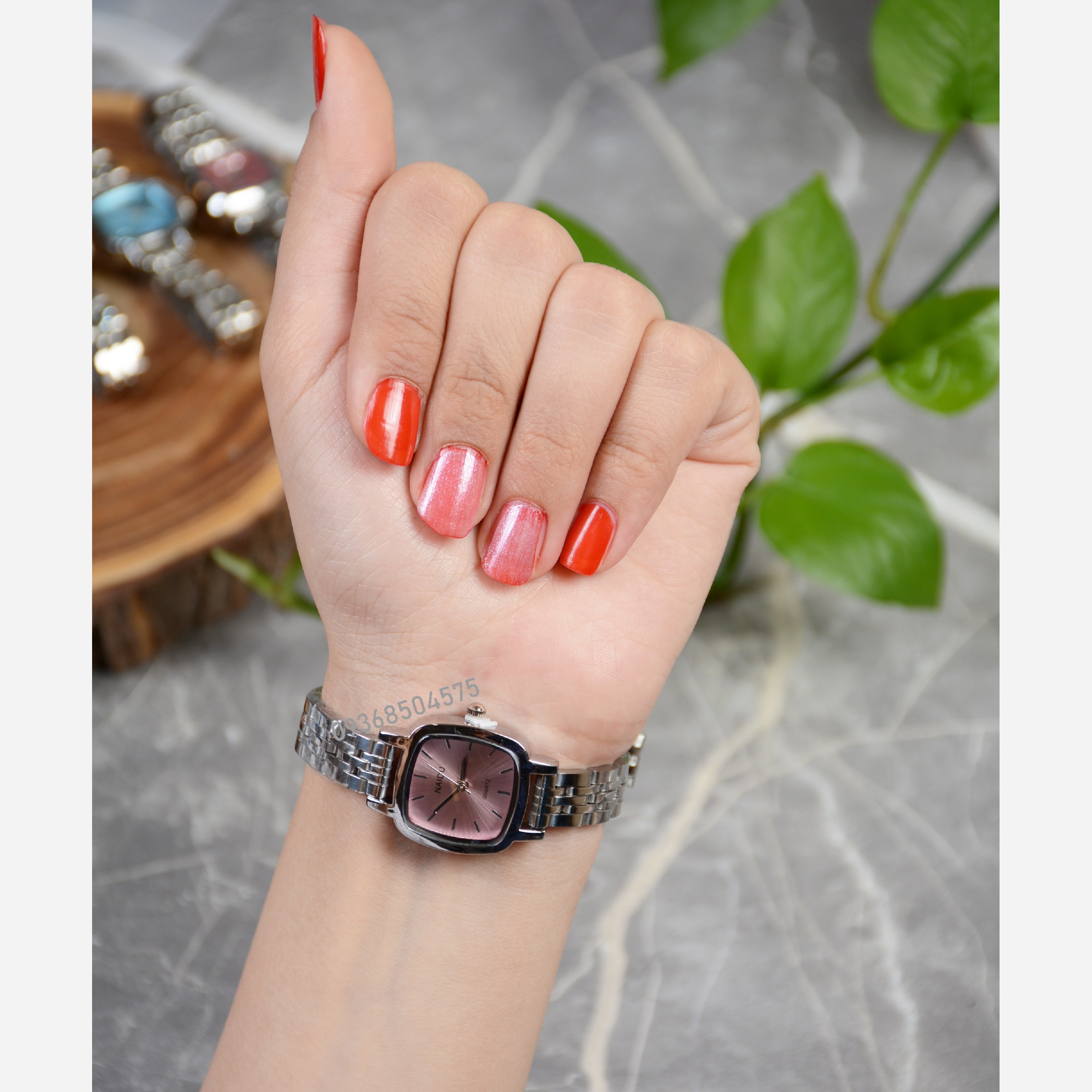 ساعت زنانه نایدو صورتی زنجیری 12