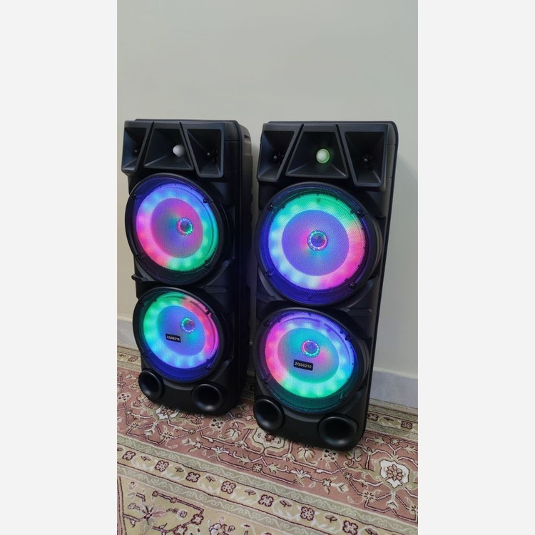 اسپیکر بلوتوثی ZQS 8210 اصلی بهمراه میکروفون بی سیم و کنترل کیفیت عالی