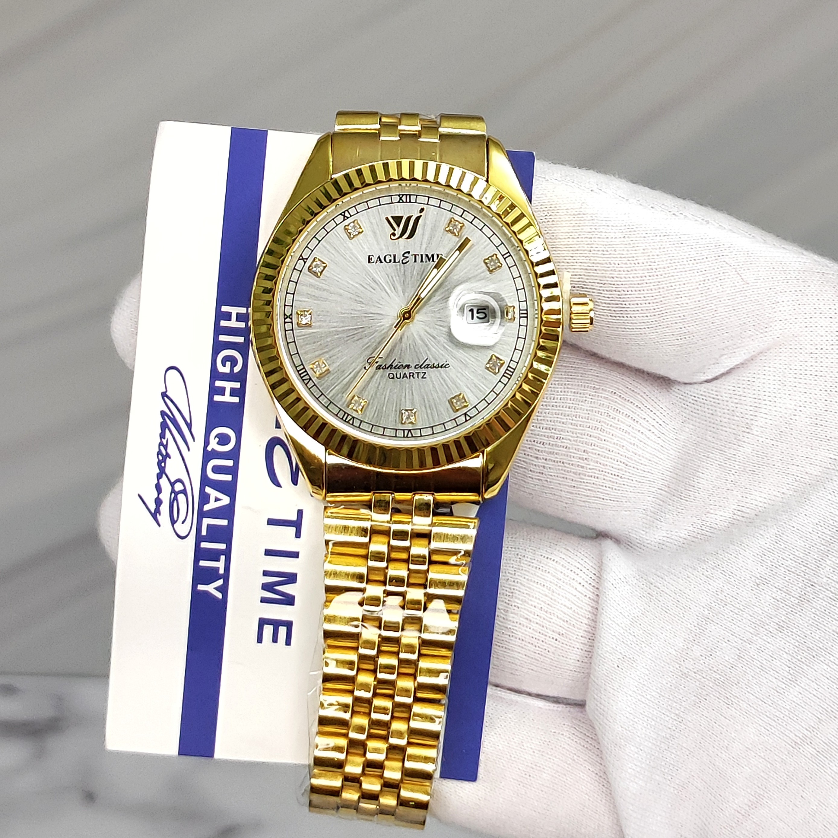 ساعت مردانه اورجینال کیفیت عالی برند EAGLE TIME  طلایی با کارت اصالت برند