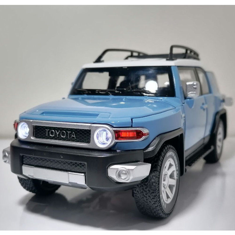 ماشین بازی آفرود مدل FJ Cruiser مقیاس 1:24، بدنه فلزی و پلاستیکی، عقبکش، چراغدار و موزیکال