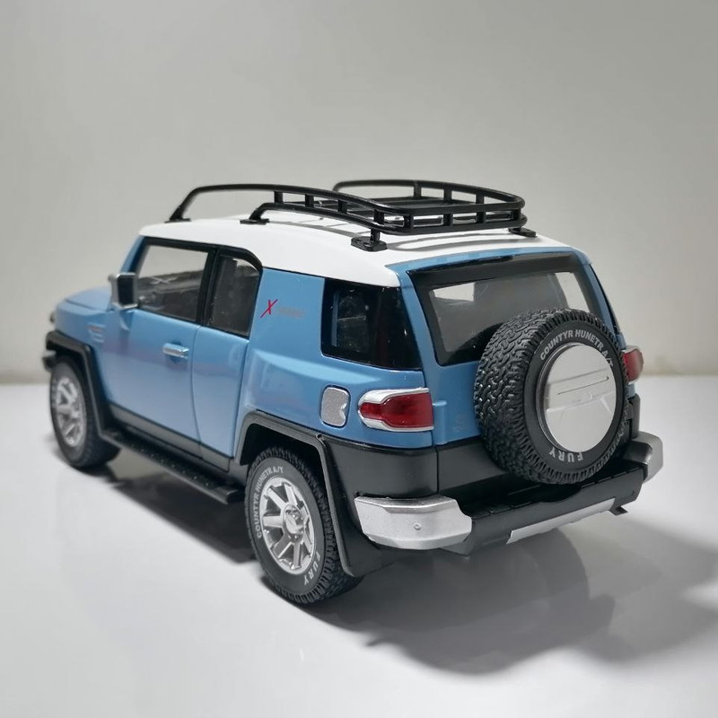 ماشین بازی آفرود مدل FJ Cruiser مقیاس 1:24، بدنه فلزی و پلاستیکی، عقبکش، چراغدار و موزیکال
